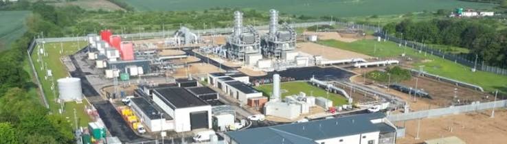 Aerial view of a gas compressor station and surrounding site