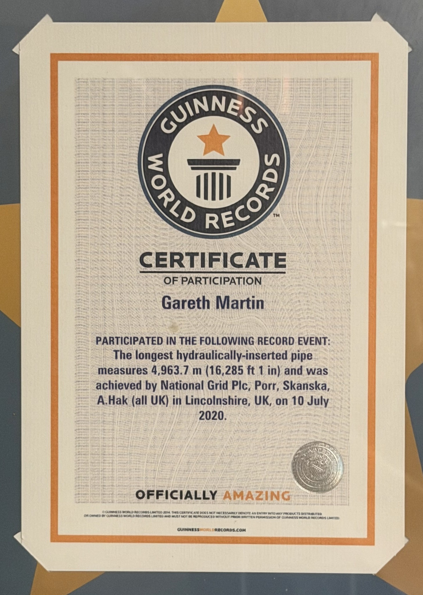 Guinness World Records certificate of participation presented to Gareth Martin for the longest hydraulically-inserted pipe record event