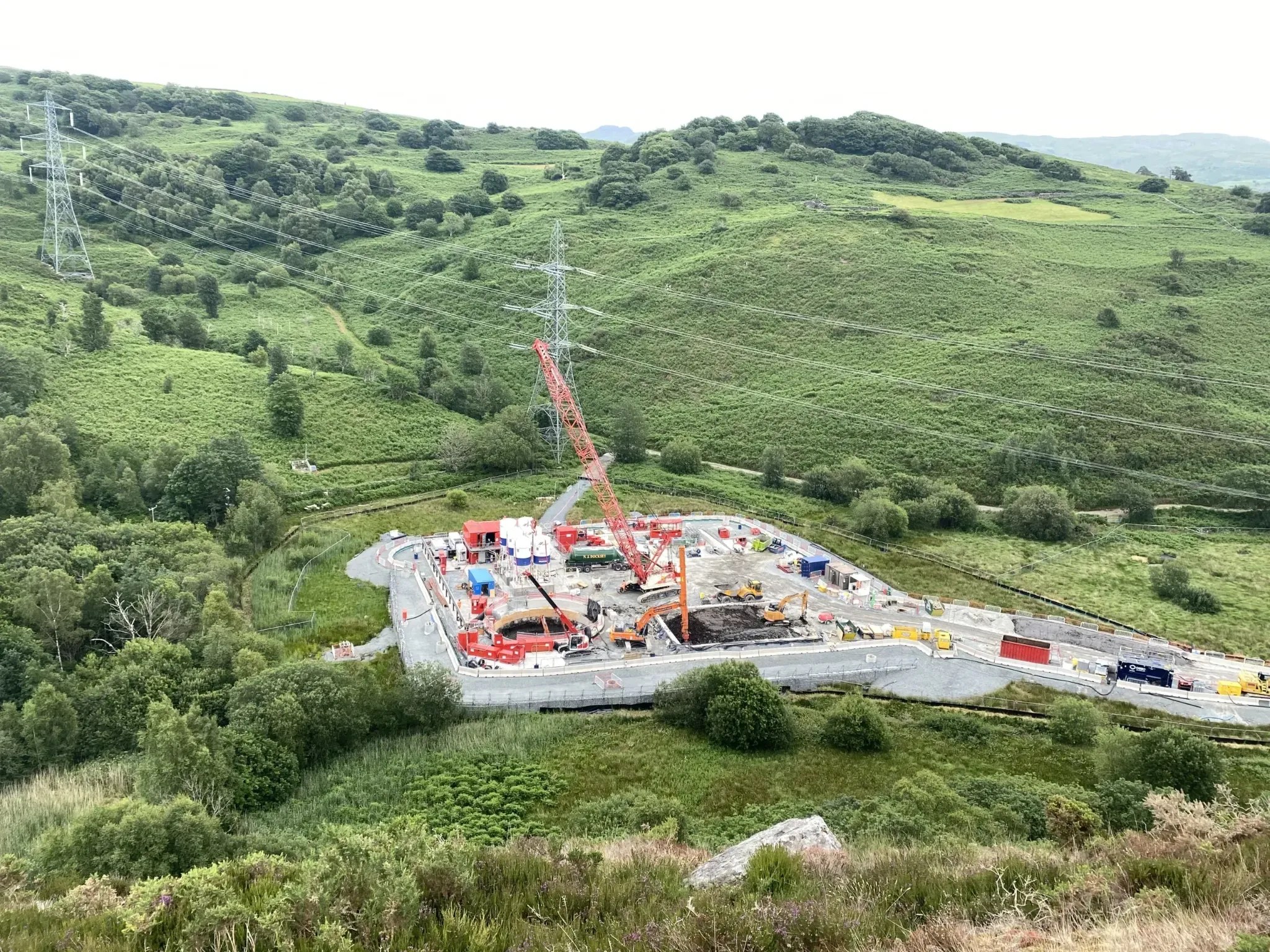 Aerial photograph of construction works in the Eryri landscape near electricity transmission lines