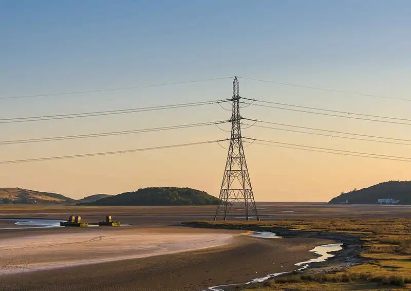 Electricity transmission pylon crossing the Dwyryd Estuary landscape